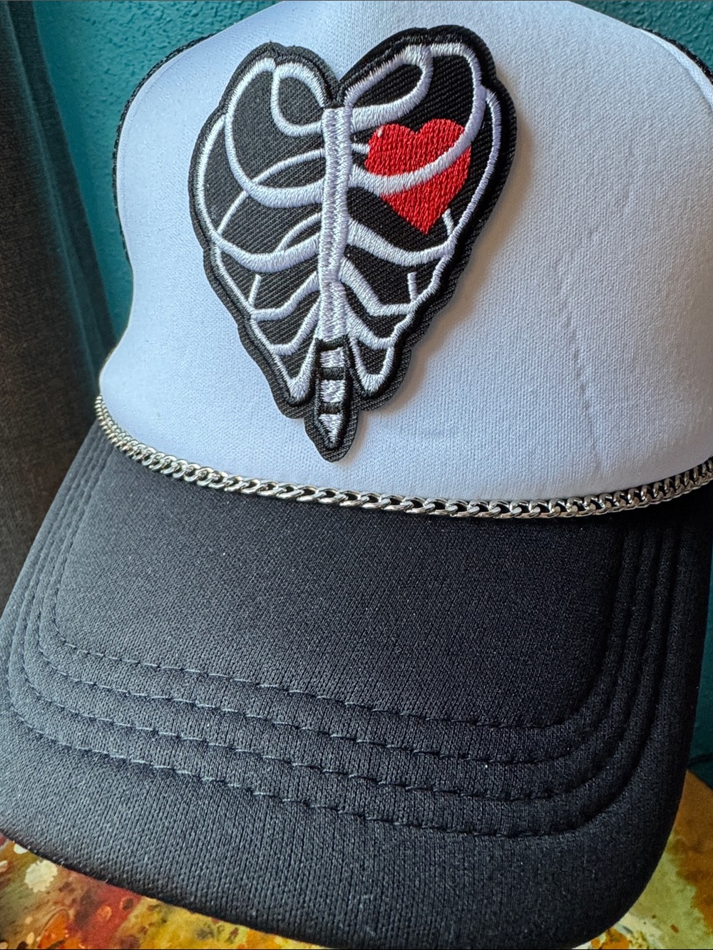 Black & White Trucker Cap with Red Heart Ribcage Patch
